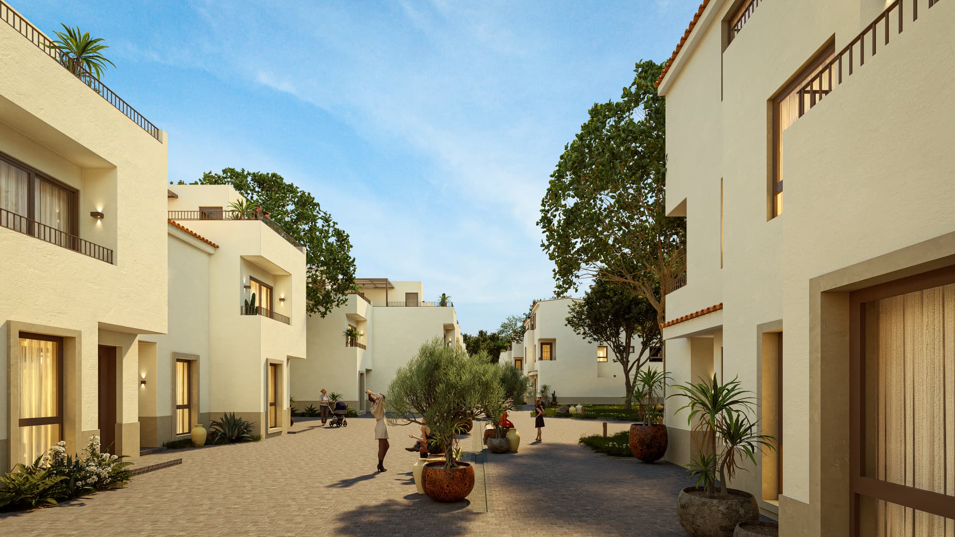 Calle de villas Nogalia con personas caminando entre jardines